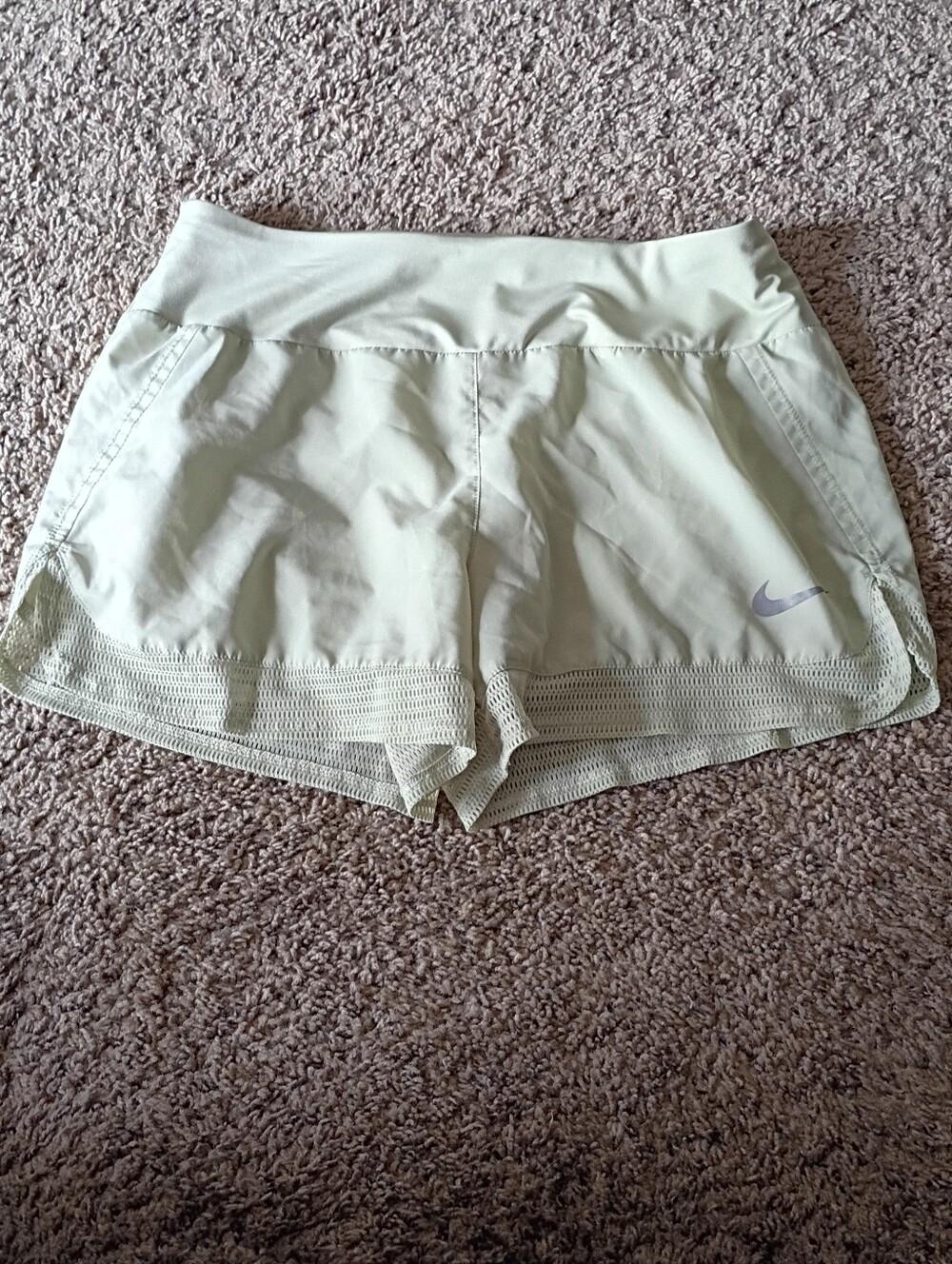 Nike Women's Pale Green Athletic Shorts with Reflective Swoosh